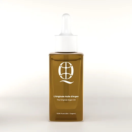Huile d'argan originale Quedebio dans un flacon de verre ambré à pipette blanche