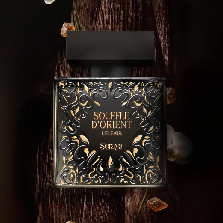 Vignette de la collection parfums corporels Seraya, le flacon Souffle d'Orient Elixir sur bois foncé avec résine d'ambre et orchidée